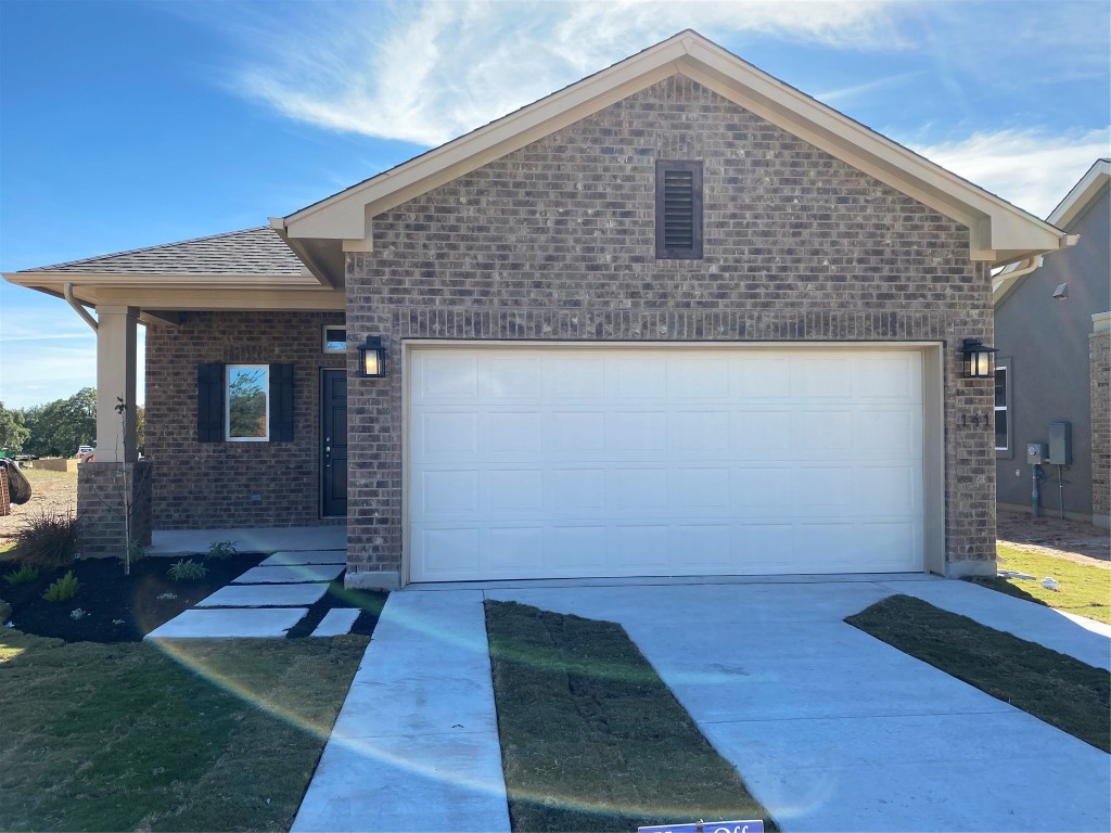 141 Monterey Oak Trail Georgetown, TX 78628 - Photo 1 of 1 a front view of house with yard