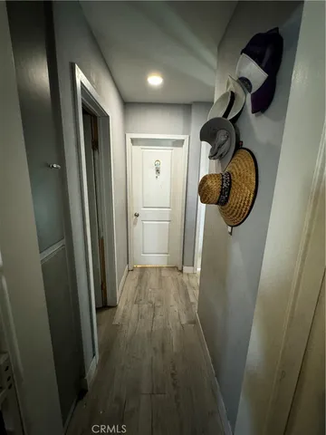 a view of hallway with washer and dryer