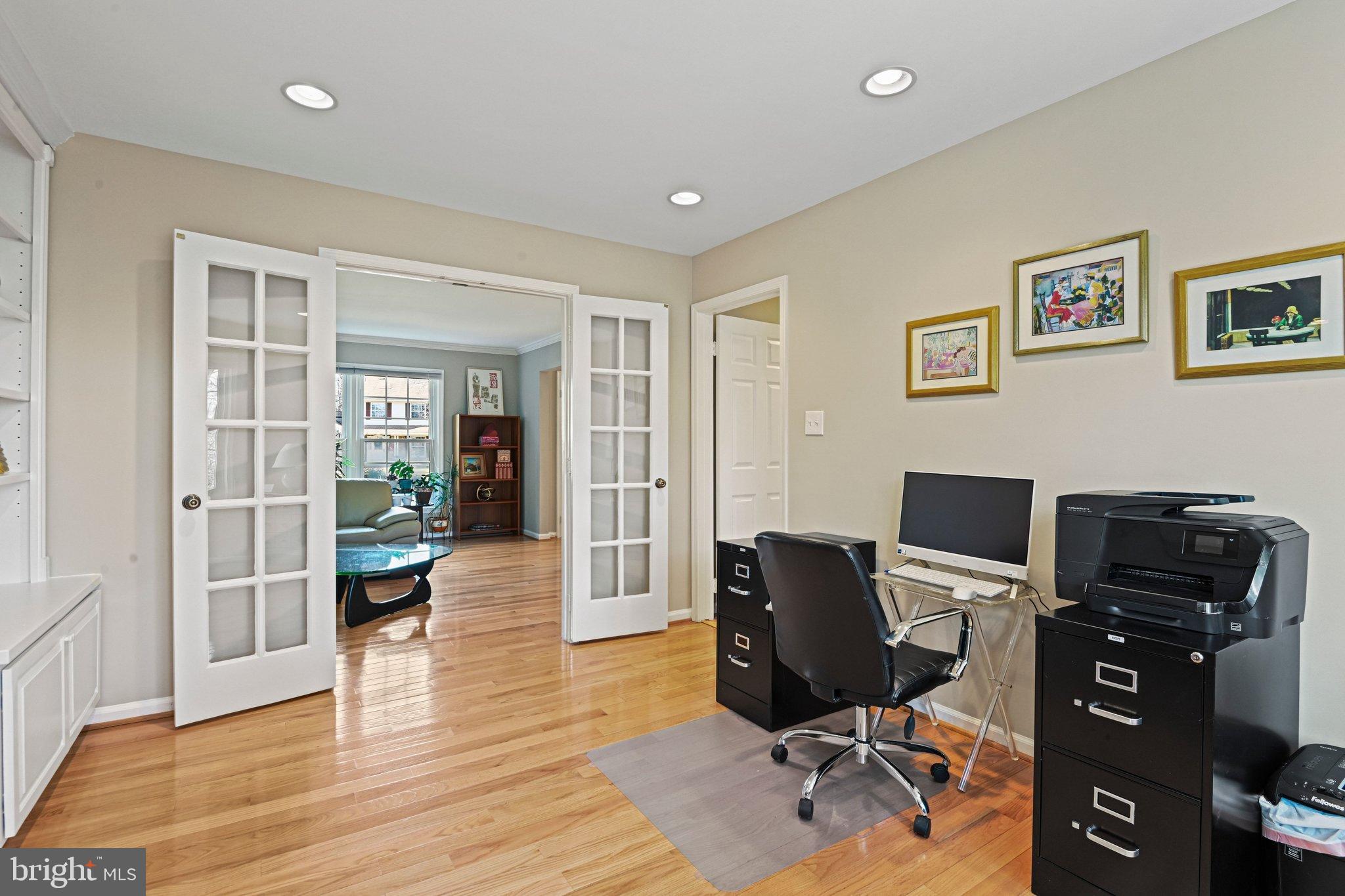 2707 Glencroft Road Vienna, VA 22181 - Photo 12 of 53 a view of a workspace with furniture and wooden floor