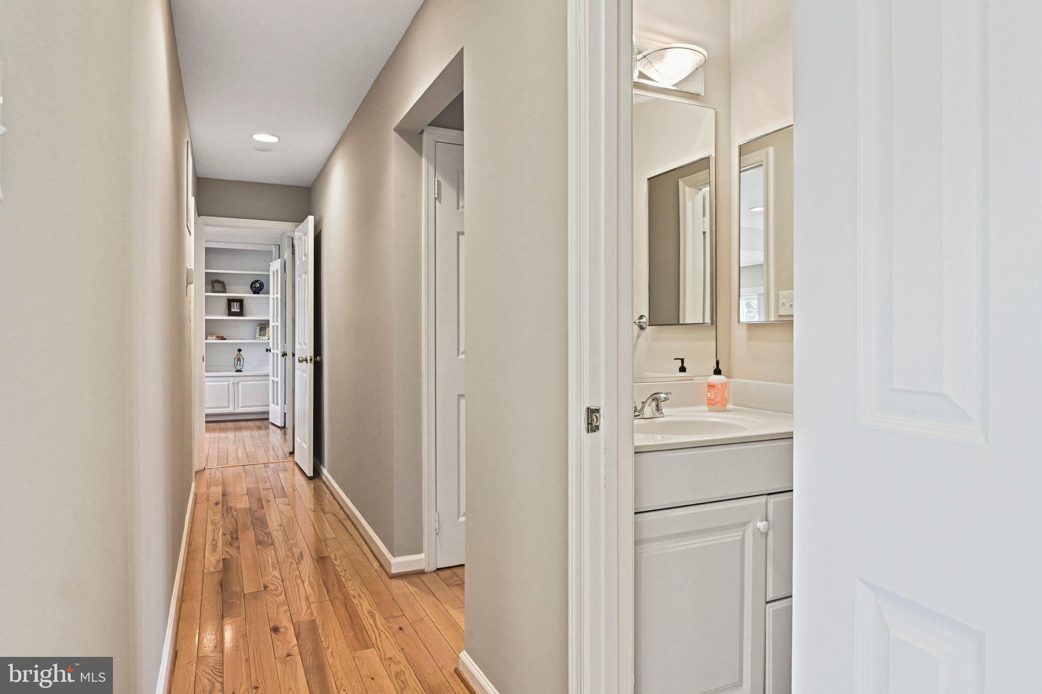 2707 Glencroft Road Vienna, VA 22181 - Photo 15 of 53 a bathroom with a sink and mirror