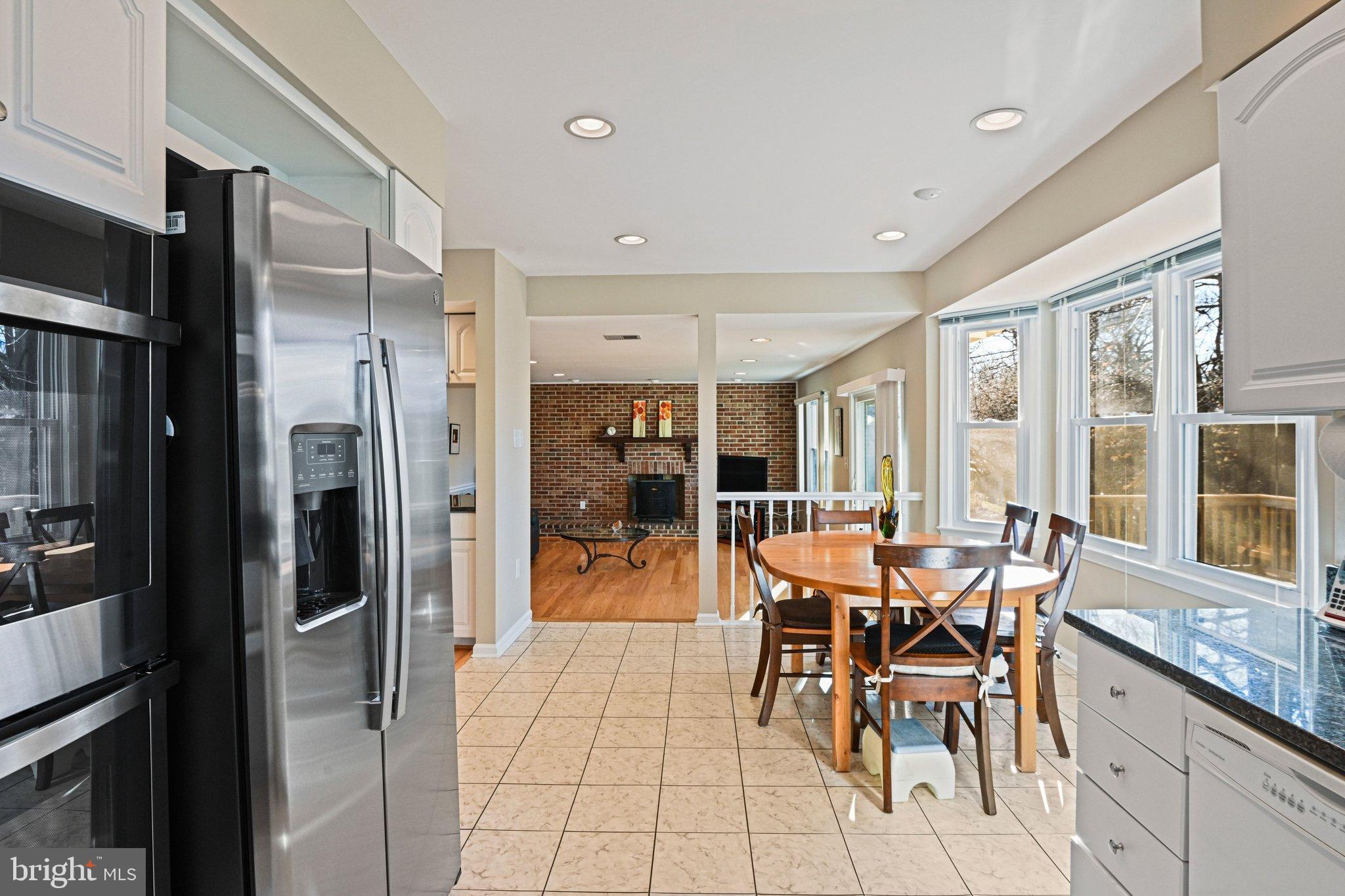 2707 Glencroft Road Vienna, VA 22181 - Photo 22 of 53 a view of a dining room with furniture window and outside view