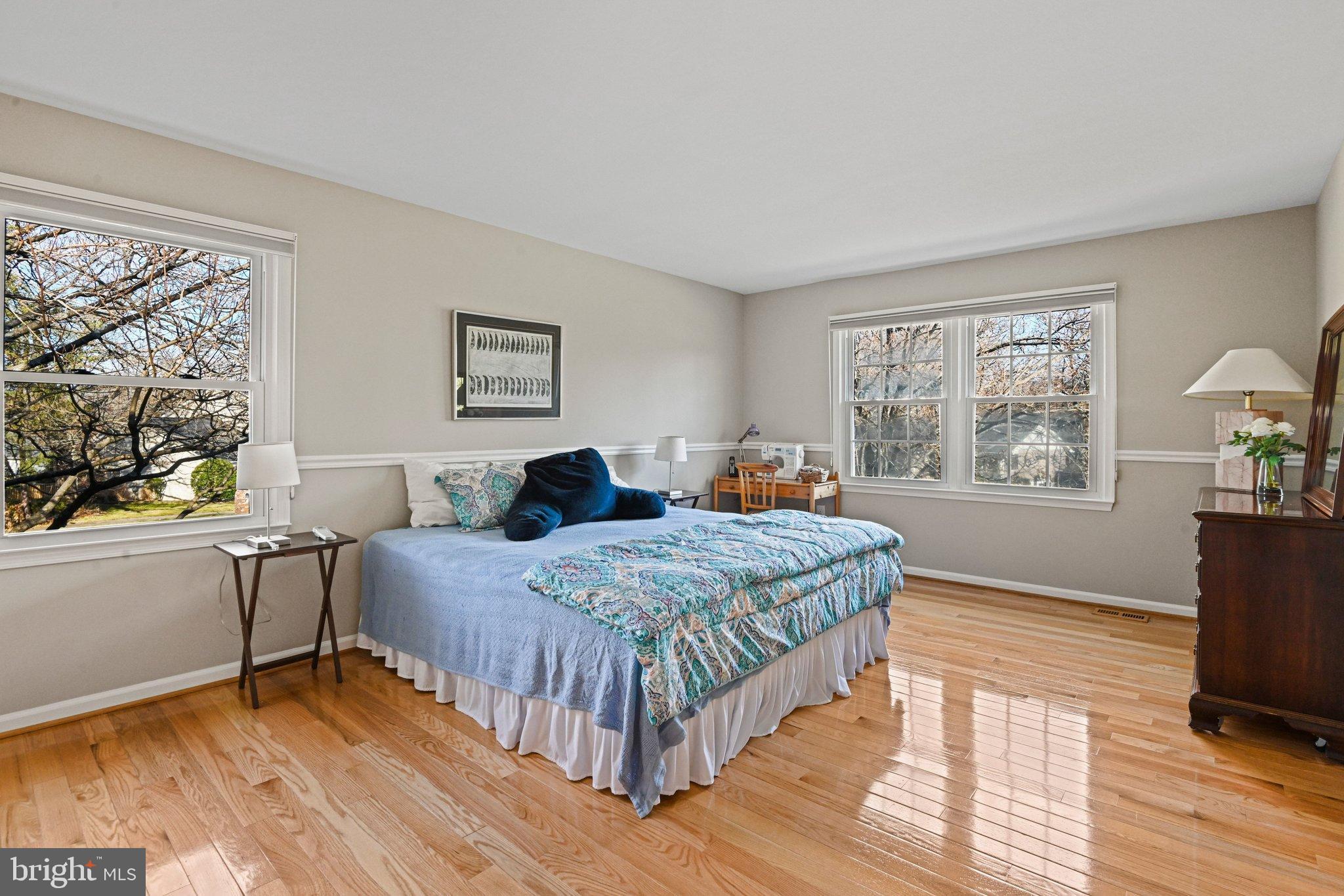 2707 Glencroft Road Vienna, VA 22181 - Photo 28 of 53 a living room with a bed furniture and a window