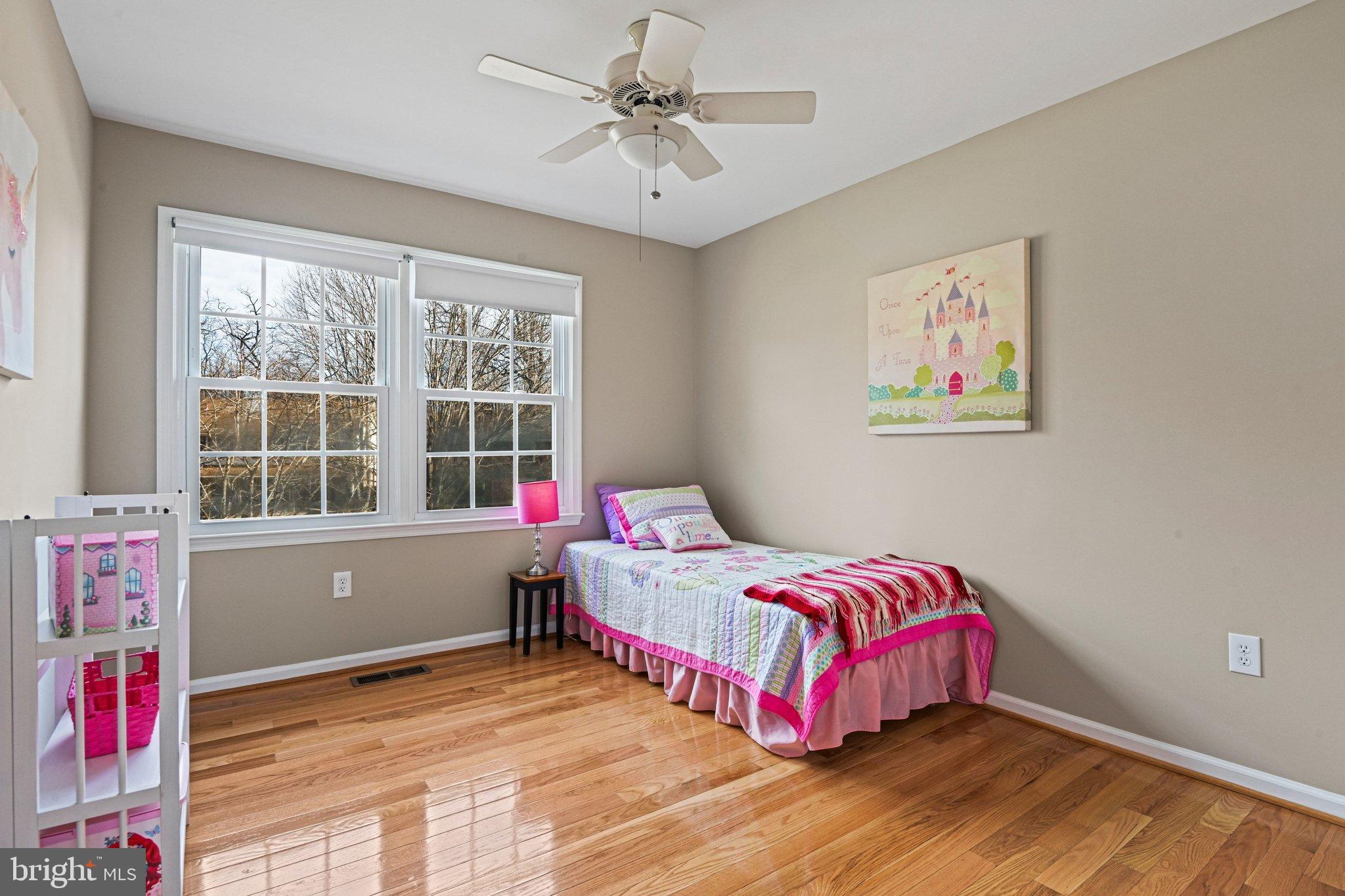 2707 Glencroft Road Vienna, VA 22181 - Photo 36 of 53 a bedroom with a bed and a window