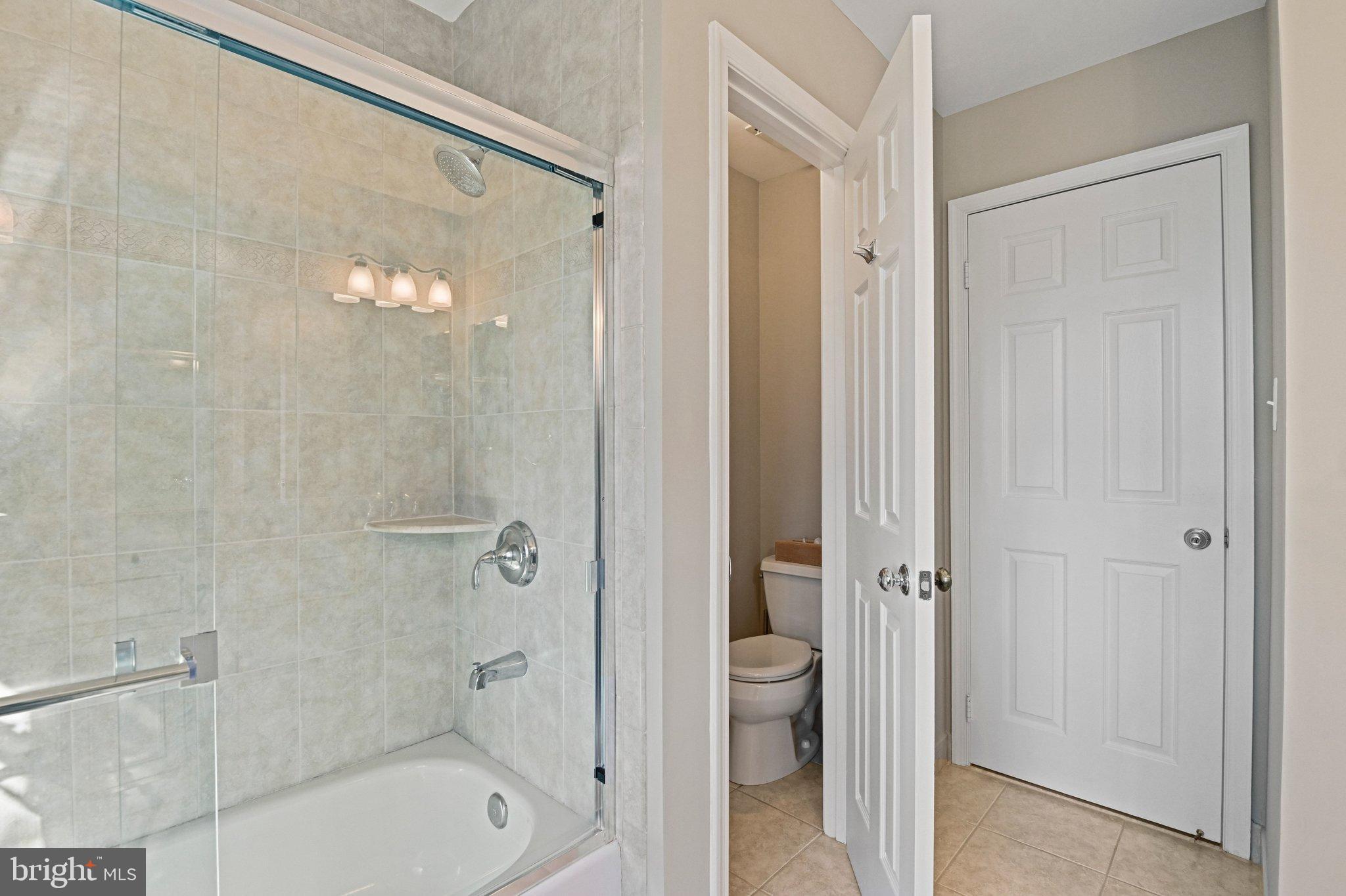 2707 Glencroft Road Vienna, VA 22181 - Photo 41 of 53 a bathroom with a shower and a toilet