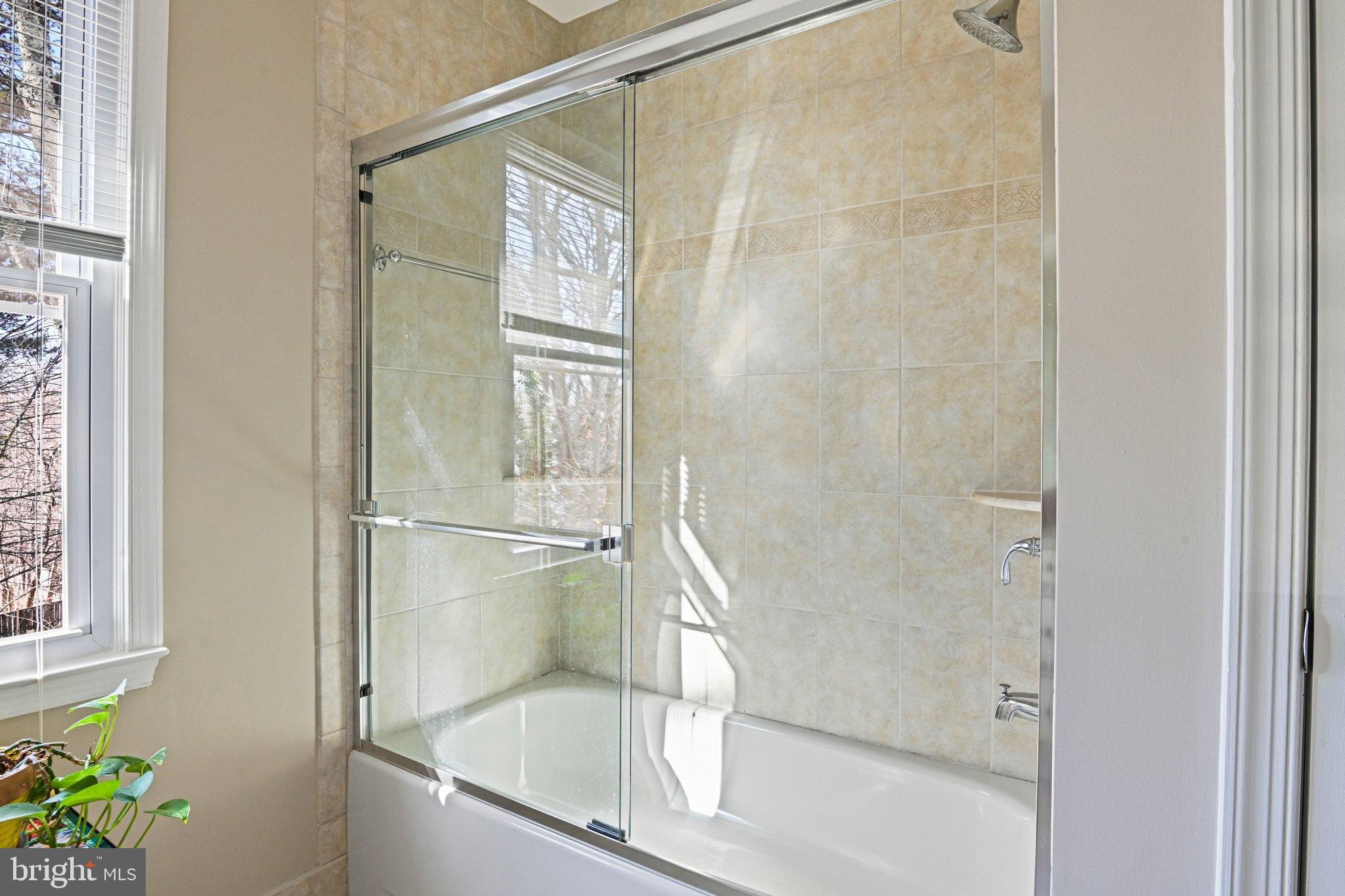 2707 Glencroft Road Vienna, VA 22181 - Photo 42 of 53 a bathroom with a bathtub