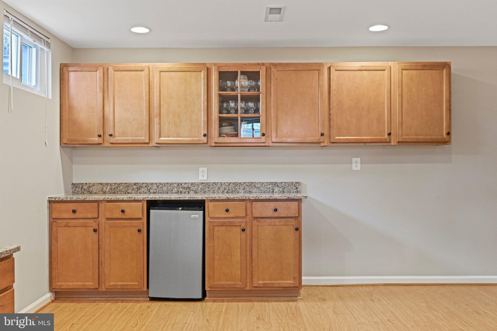 2707 Glencroft Road Vienna, VA 22181 - Photo 45 of 53 a view of kitchen with granite countertop cabinets