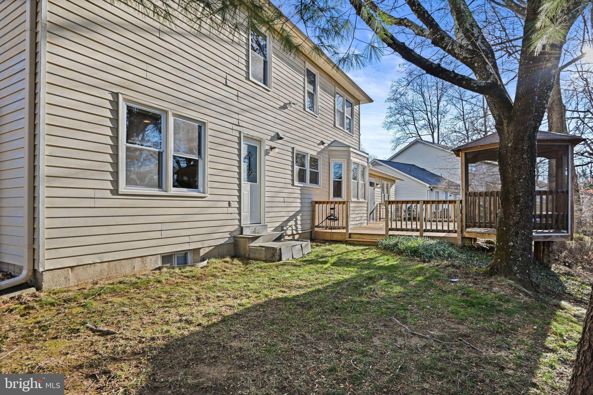 2707 Glencroft Road Vienna, VA 22181 - Photo 49 of 53 Charming backyard with inviting deck space.