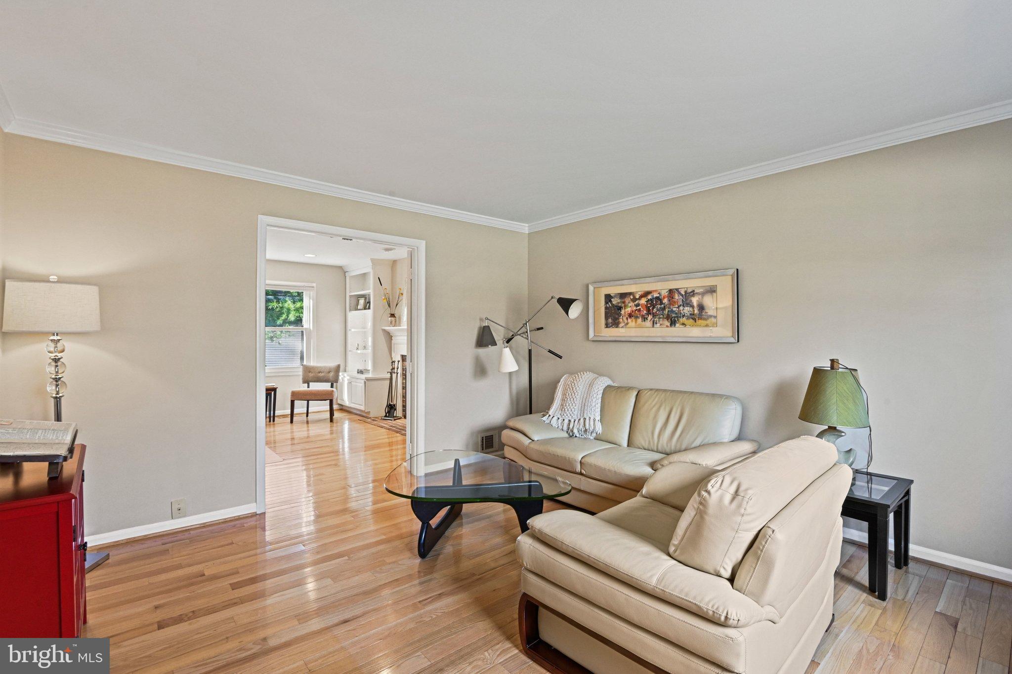 2707 Glencroft Road Vienna, VA 22181 - Photo 8 of 53 a living room with furniture and a wooden floor