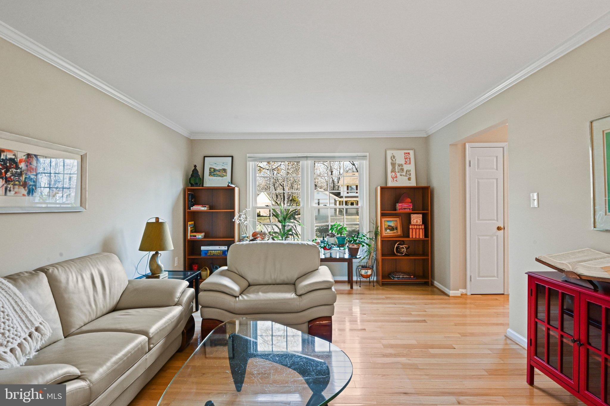 2707 Glencroft Road Vienna, VA 22181 - Photo 9 of 53 a living room with furniture and a wooden floor