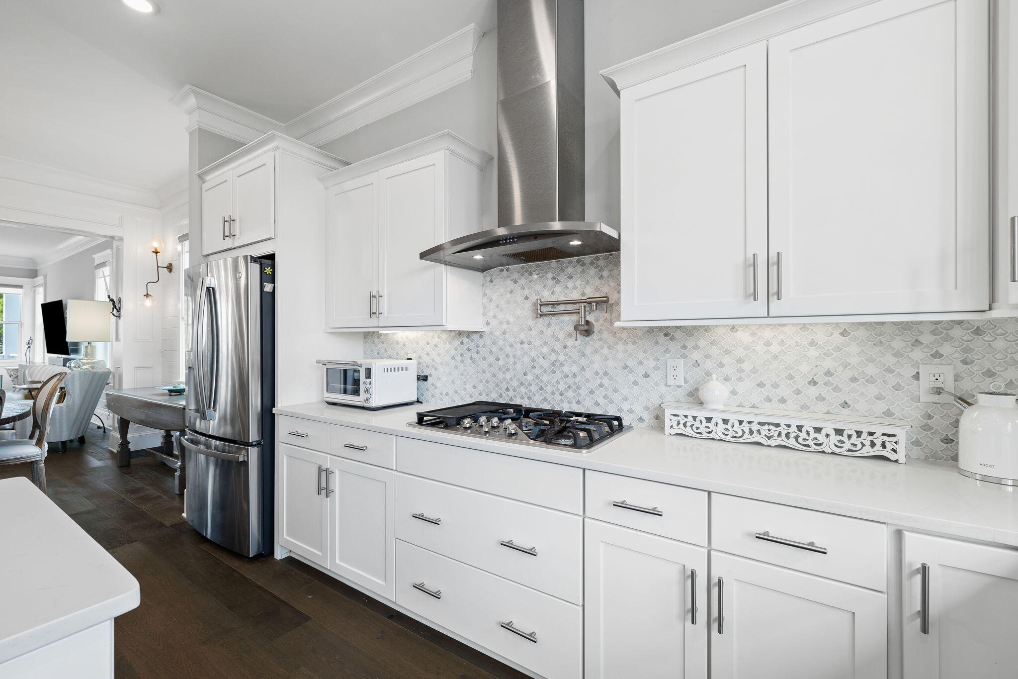 4 Clipper Street Inlet Beach, FL 32461 - Photo 20 of 49 a kitchen with stainless steel appliances white cabinets and a refrigerator