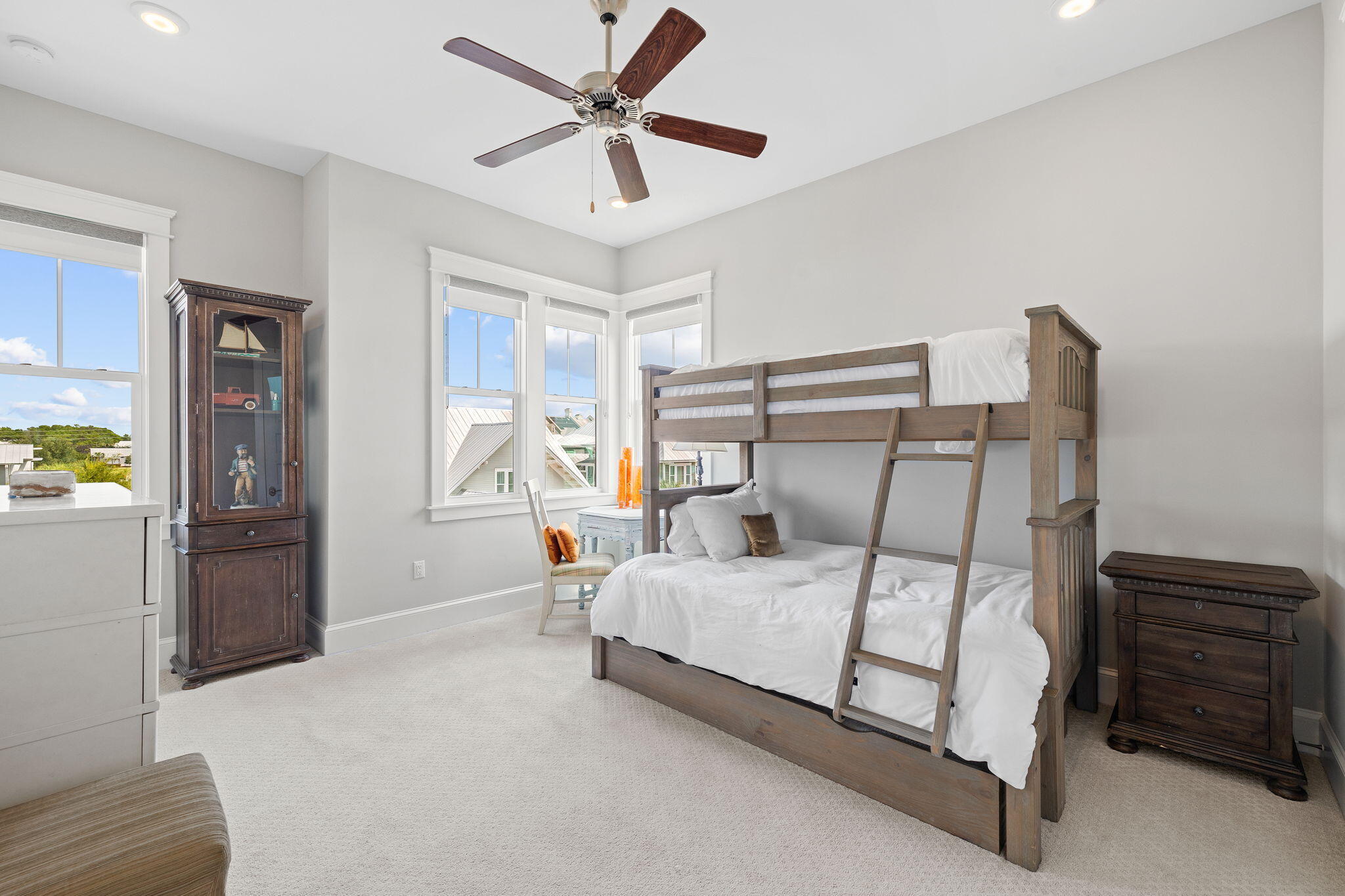 4 Clipper Street Inlet Beach, FL 32461 - Photo 23 of 49 a bedroom with a bed and a chandelier