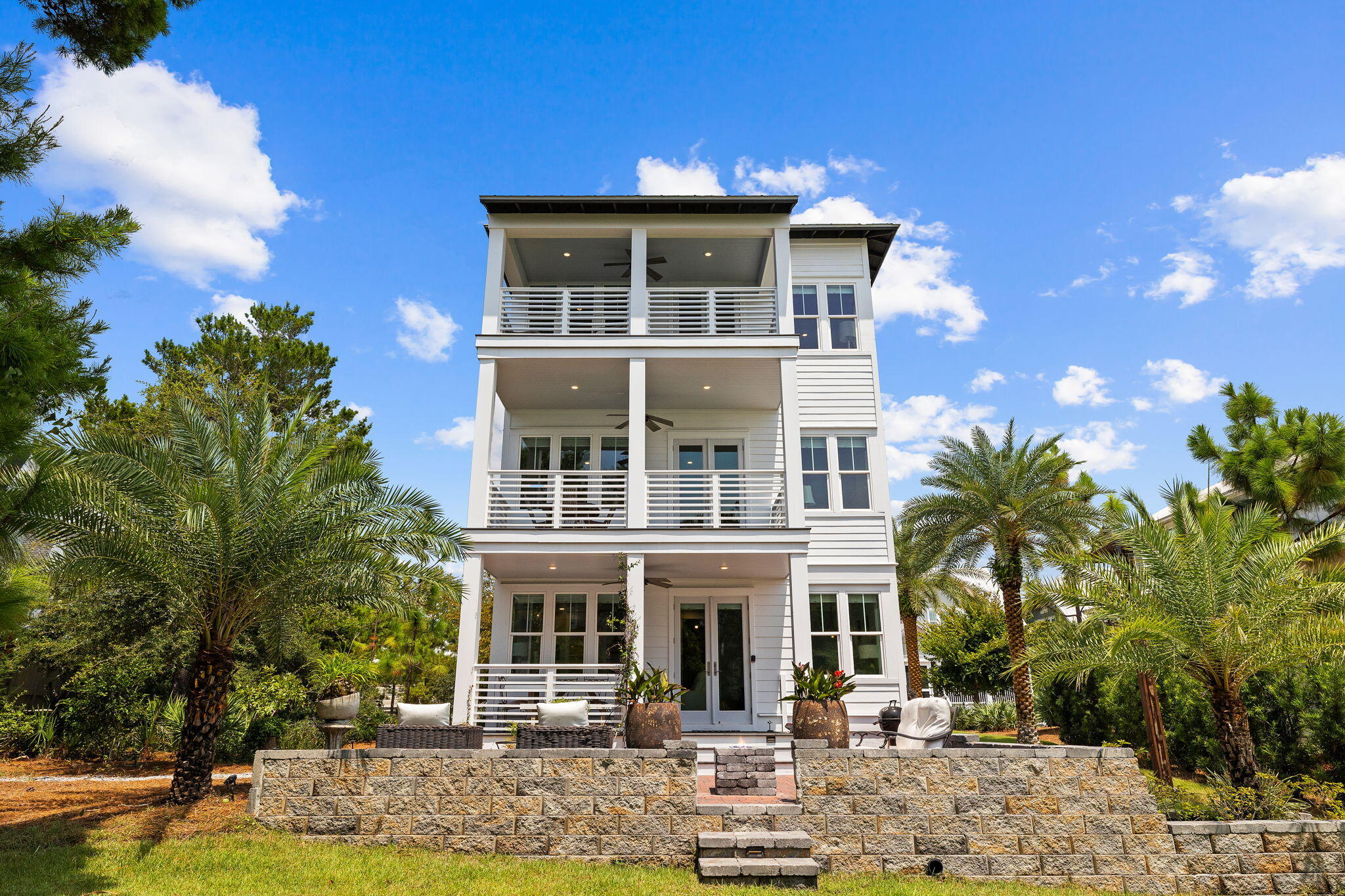 4 Clipper Street Inlet Beach, FL 32461 - Photo 3 of 49 a front view of a house with swimming pool