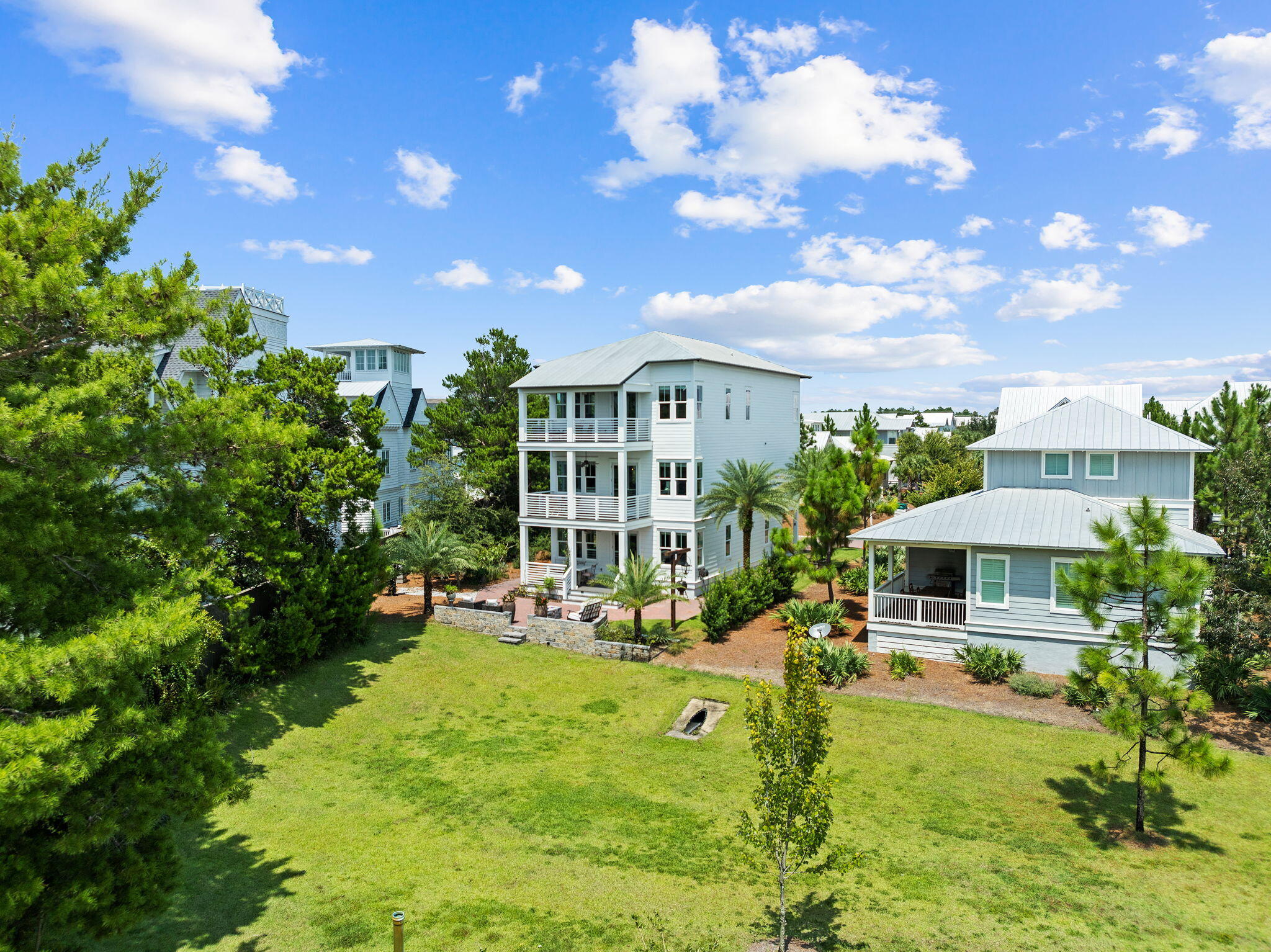 4 Clipper Street Inlet Beach, FL 32461 - Photo 36 of 49 a view of house with swimming pool outdoor seating