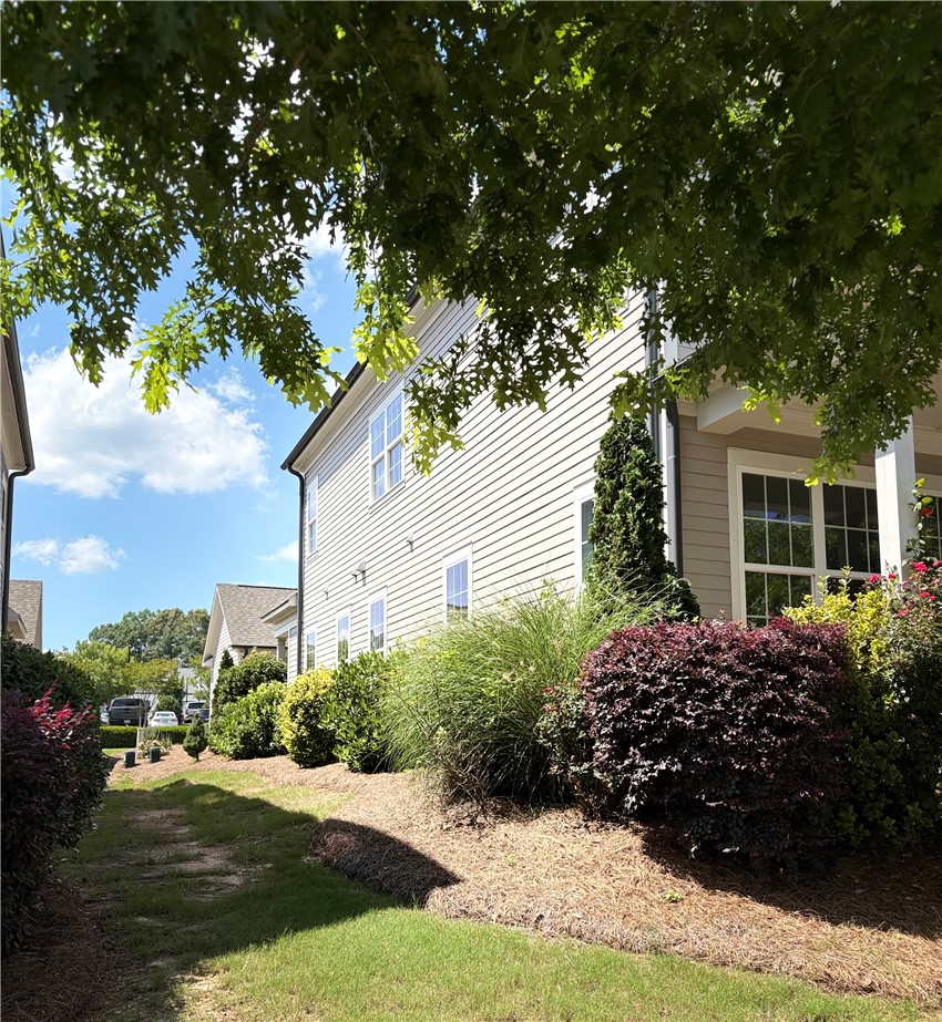 118 Tuttle Street Clemson, SC 29631 - Photo 2 of 9 Well-maintained landscaping and exterior details create inviting curb appeal.