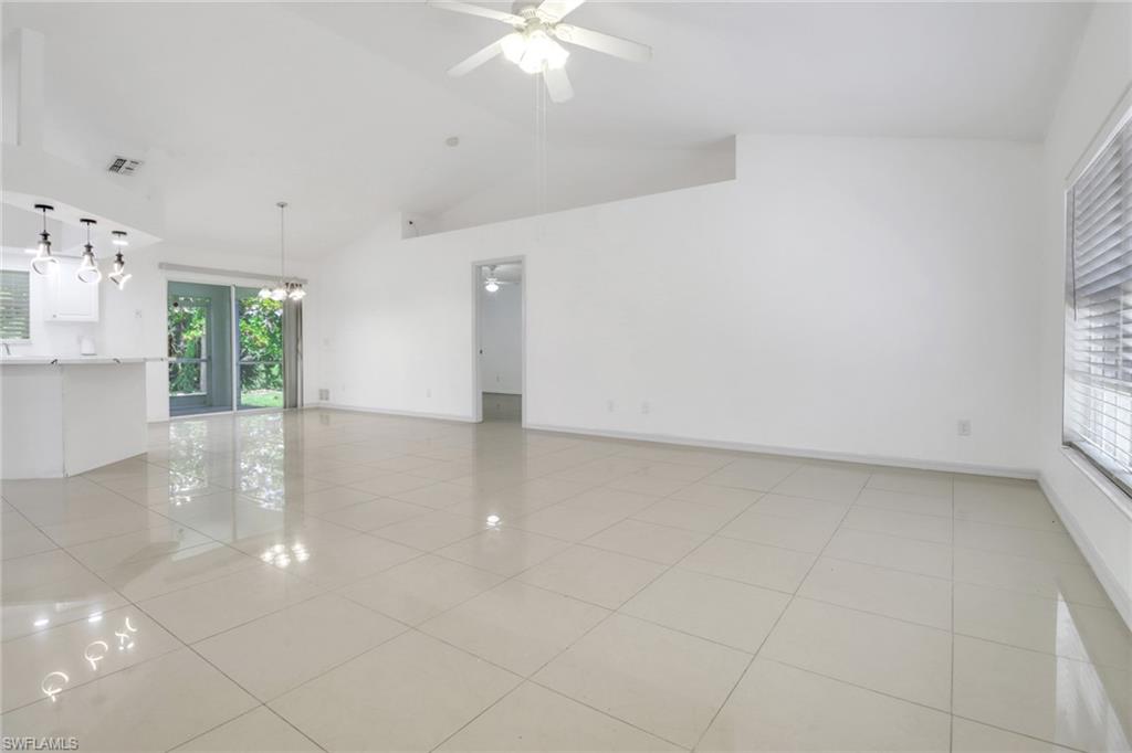 765 Aprile Avenue South Lehigh Acres, FL 33974 - Photo 12 of 32 a view of an empty room with a window