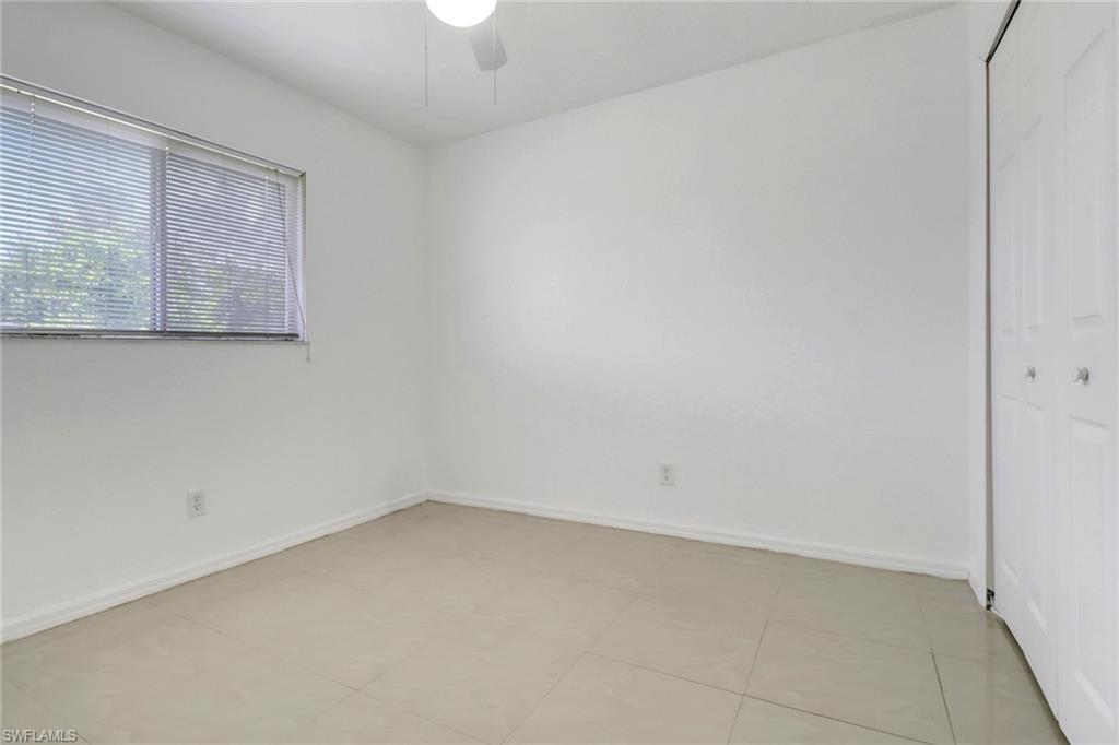 765 Aprile Avenue South Lehigh Acres, FL 33974 - Photo 18 of 32 an empty room with a window