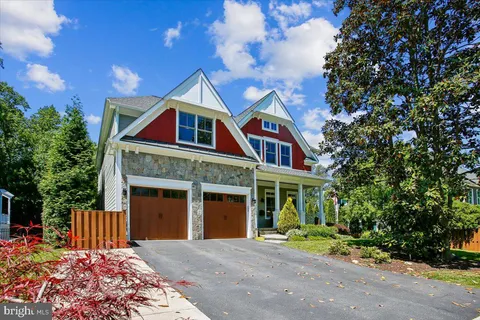 a front view of a house with a porch