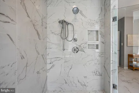a utility room with sink dryer and washer