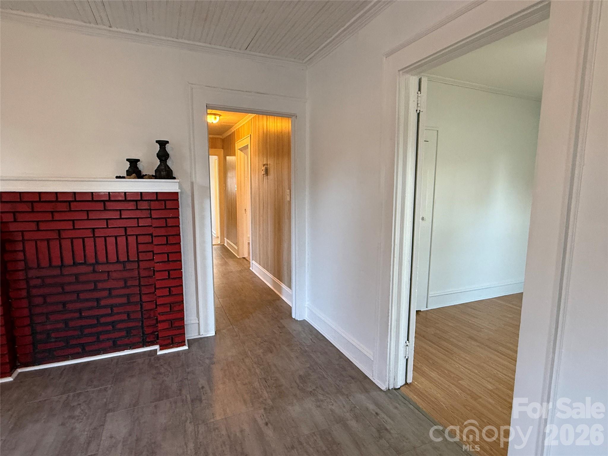 2603 5th Avenue Southwest Hickory, NC 28602 - Photo 11 of 31 a view of a hallway with wooden floor and closet