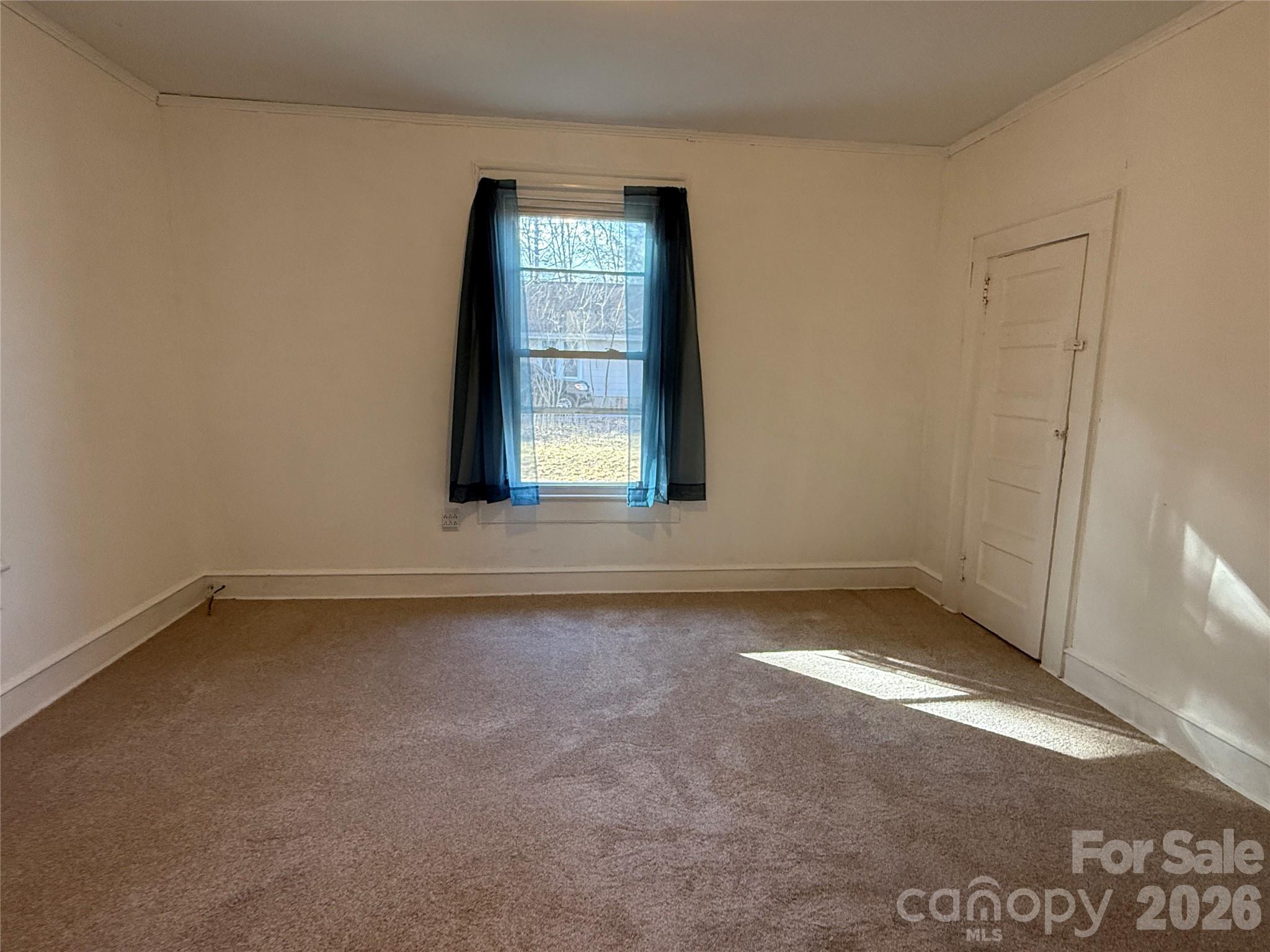 2603 5th Avenue Southwest Hickory, NC 28602 - Photo 18 of 31 an empty room with windows