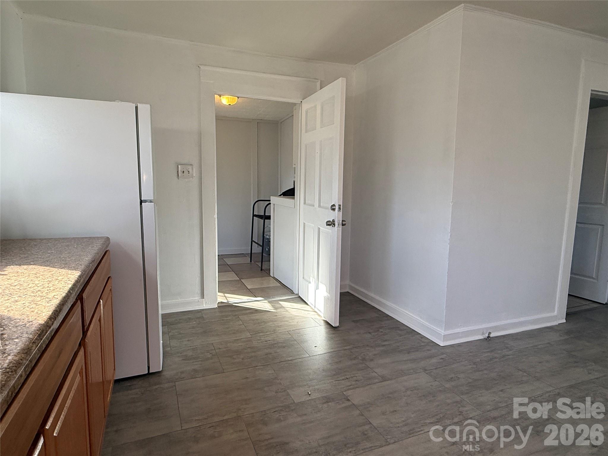 2603 5th Avenue Southwest Hickory, NC 28602 - Photo 29 of 31 a view of a kitchen cabinets and wooden floor