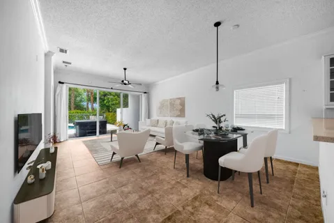 a view of an empty room with a balcony