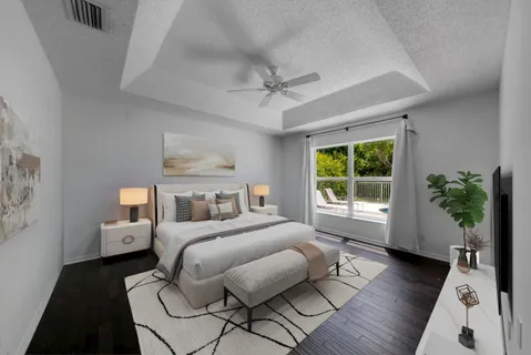 a bathroom with a double vanity sink mirror and bathtub