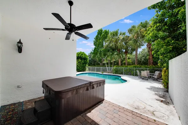 a view of a swimming pool with back yard