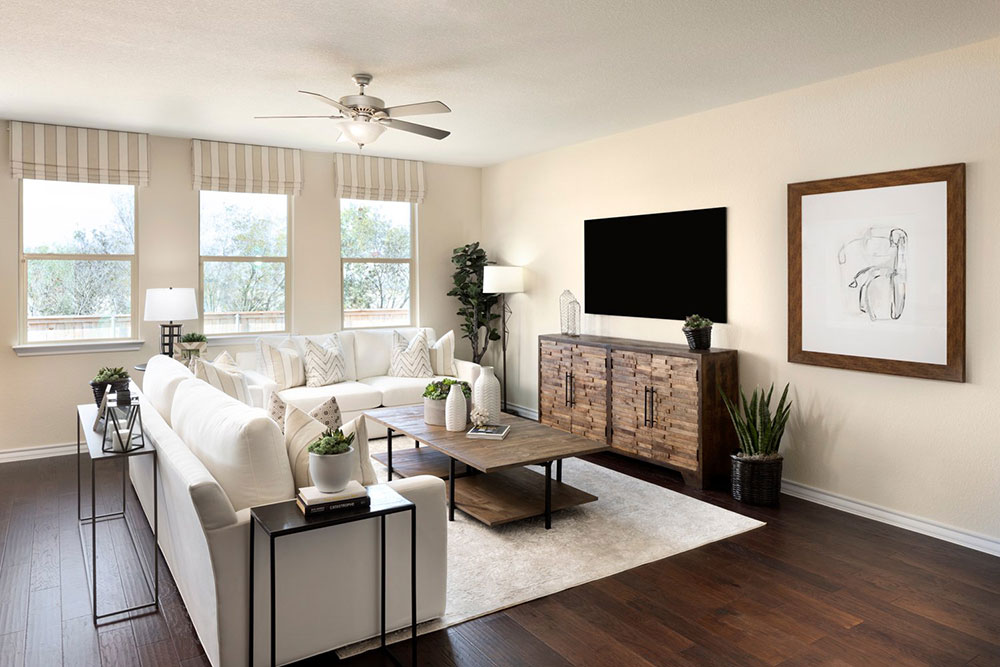 1608 Jonas Cove Pflugerville, TX 78660 - Photo 4 of 25 a living room with furniture and a flat screen tv