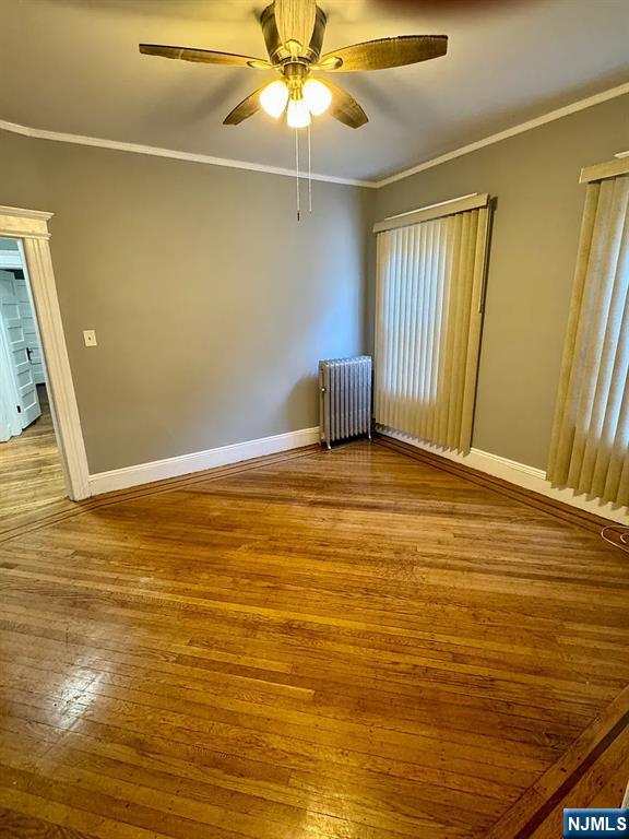 57 Maolis Avenue, Unit 2 Bloomfield, NJ 07003 - Photo 7 of 22 a view of an empty room with window