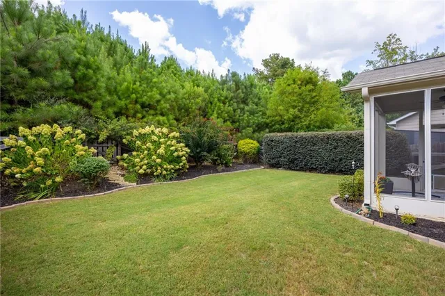 a view of a backyard with a garden