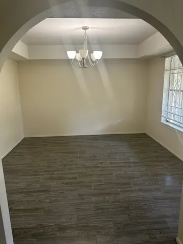 a view of a room with an empty space