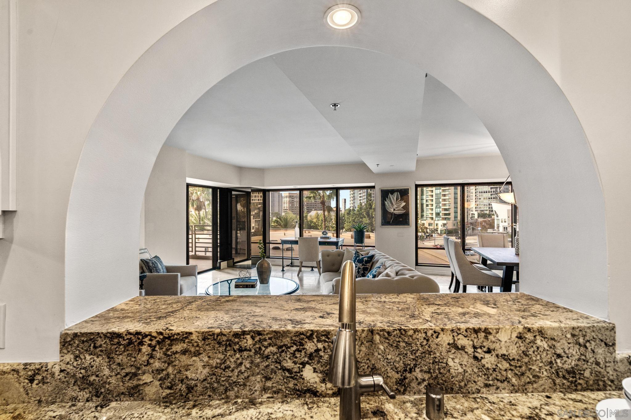 100 Harbor Drive, Unit 505 San Diego, CA 92101 - Photo 30 of 33 a bed room with a large bed and a large window