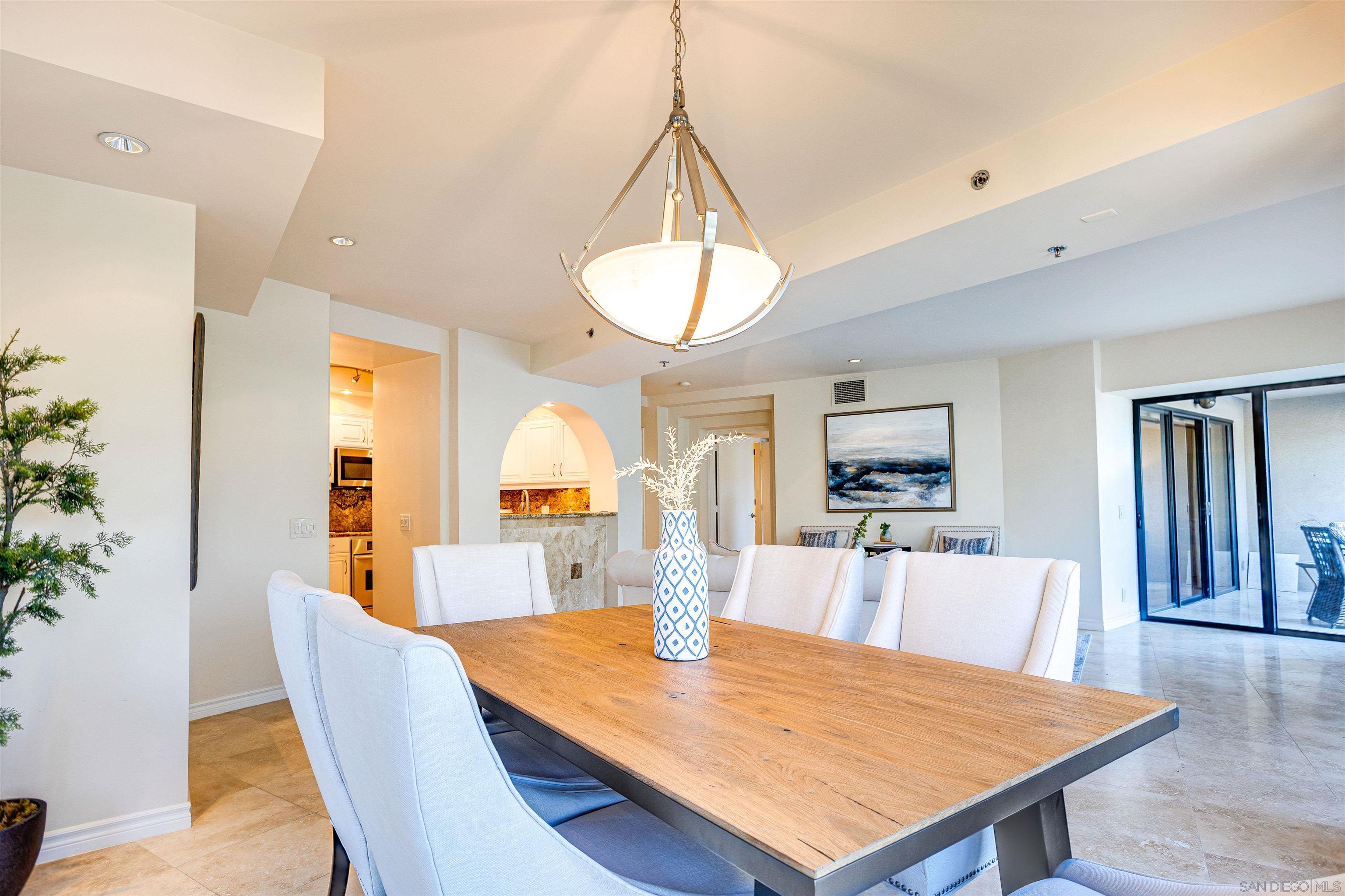 100 Harbor Drive, Unit 505 San Diego, CA 92101 - Photo 7 of 33 a view of a dining room with furniture