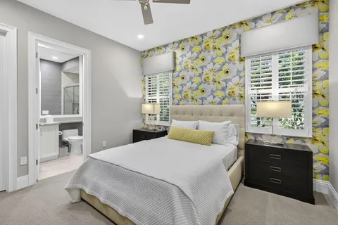 a view of a room with lots of wooden furniture