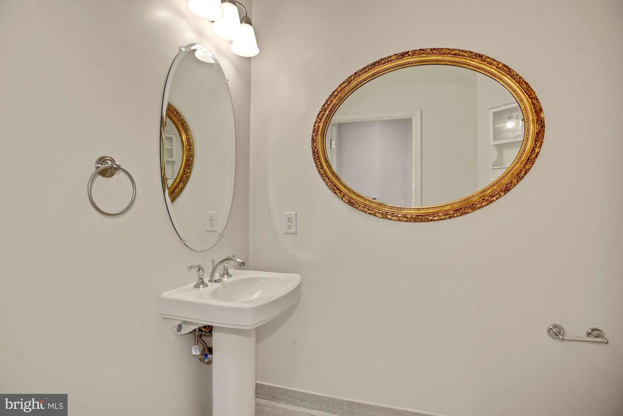 1830 Fountain Drive, Unit 1501 Reston, VA 20190 - Photo 13 of 62 Powder Room off Living Room