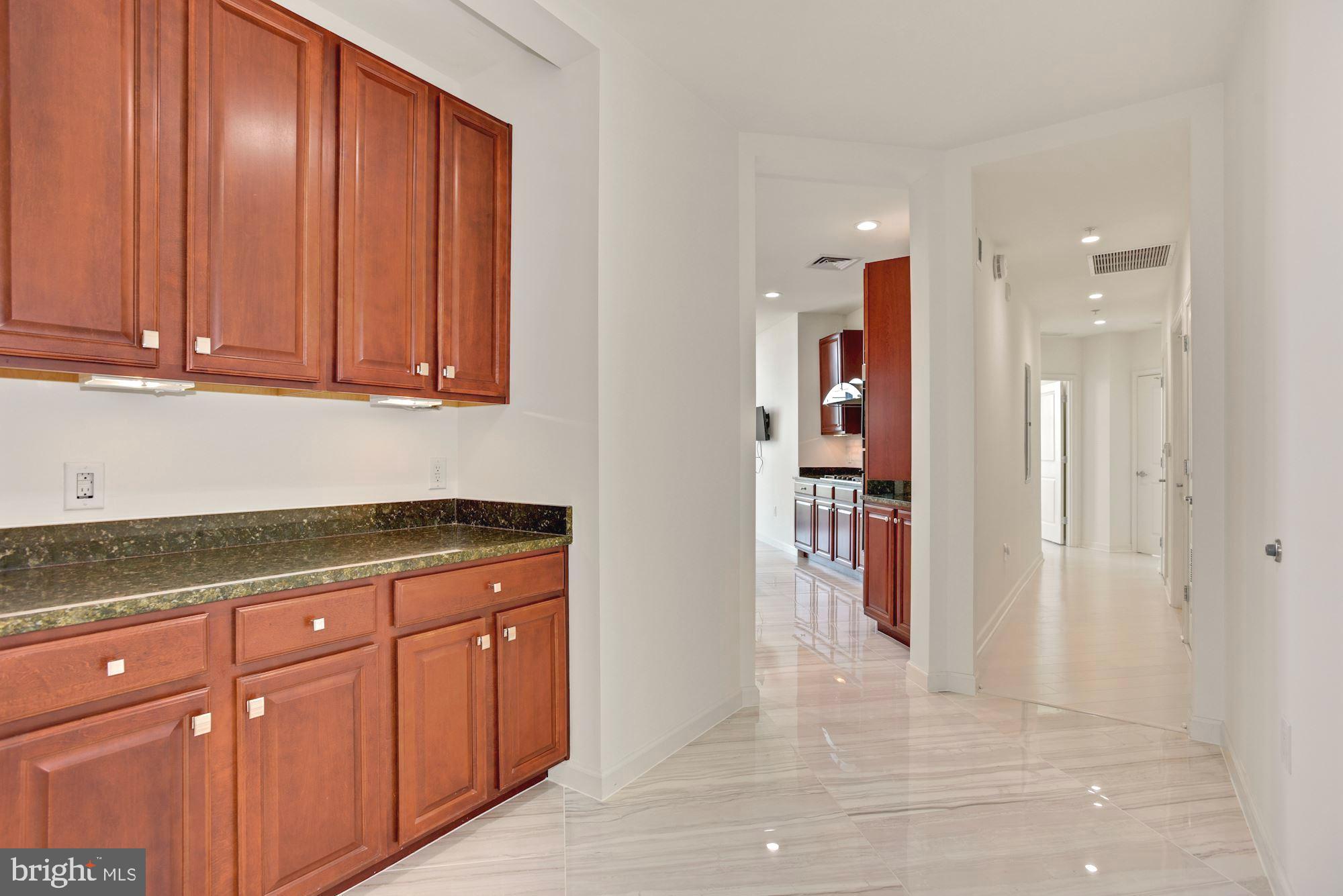 1830 Fountain Drive, Unit 1501 Reston, VA 20190 - Photo 19 of 62 Butler Pantry between the Living Room and Kitchen