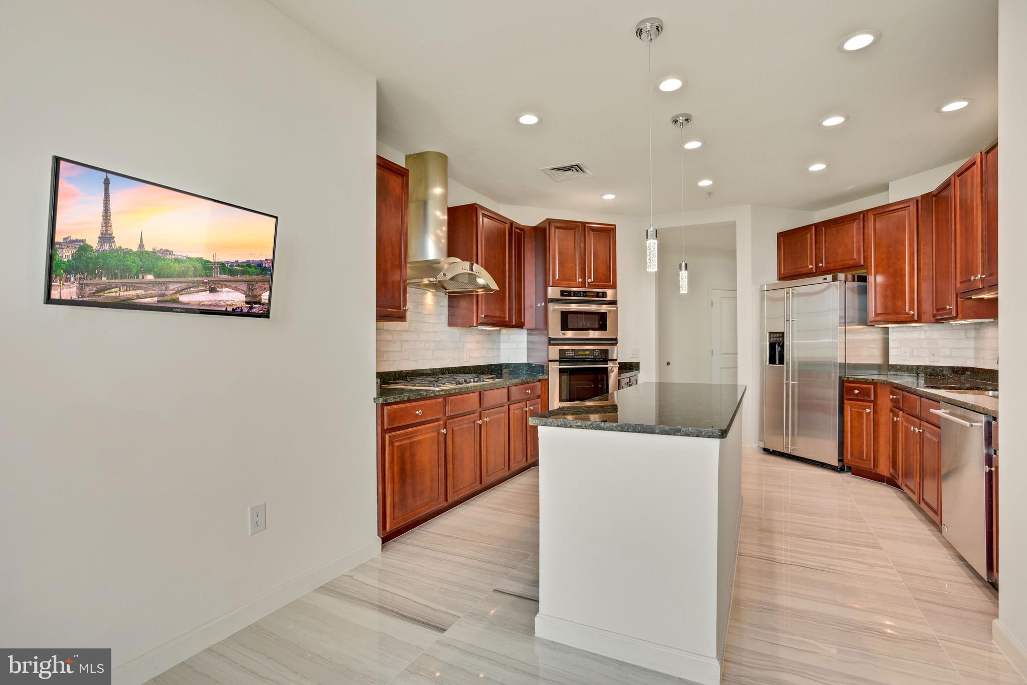 1830 Fountain Drive, Unit 1501 Reston, VA 20190 - Photo 21 of 62 Kitchen Showing Kitchen Island