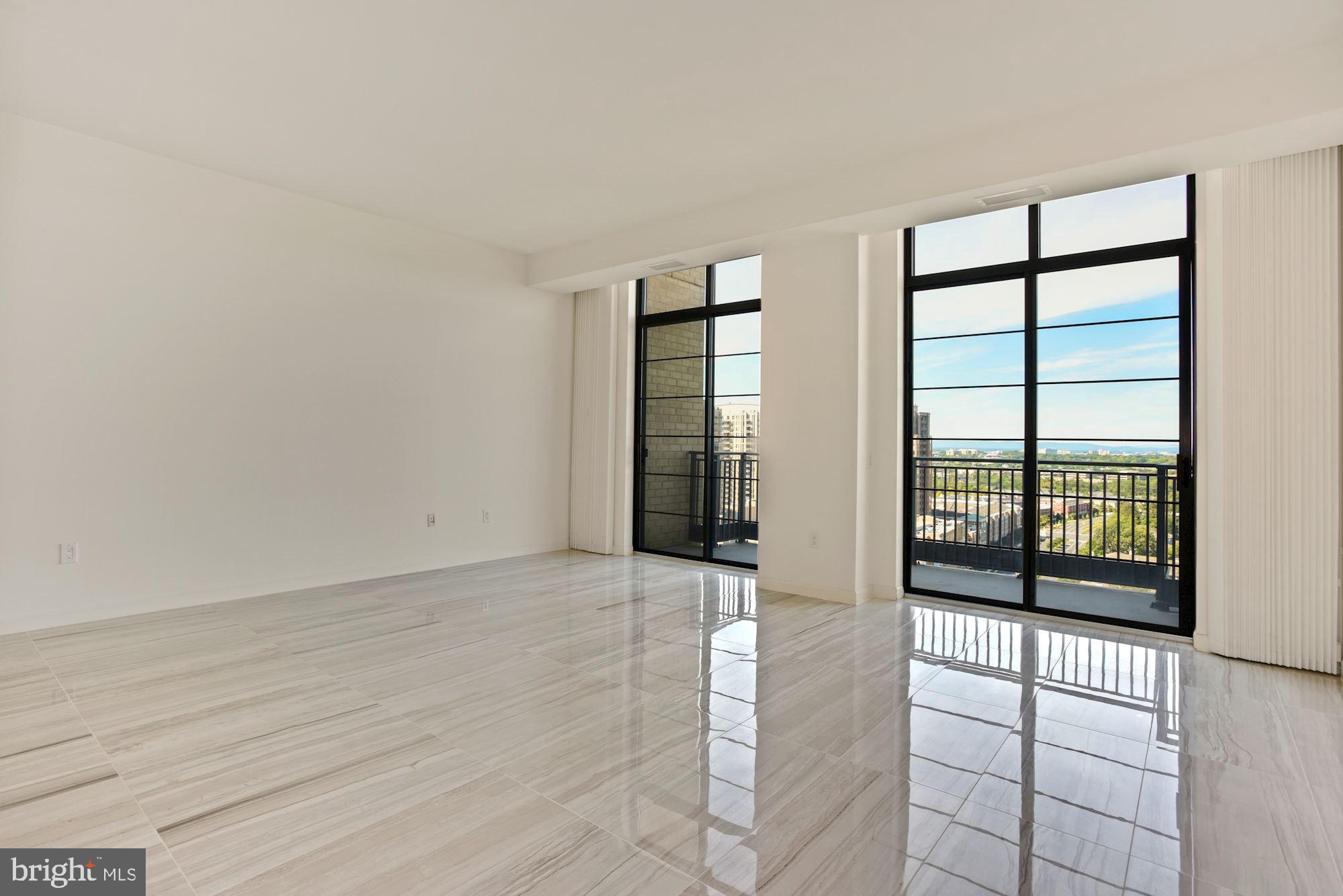 1830 Fountain Drive, Unit 1501 Reston, VA 20190 - Photo 9 of 62 Another shot of Living Room Exposing the View