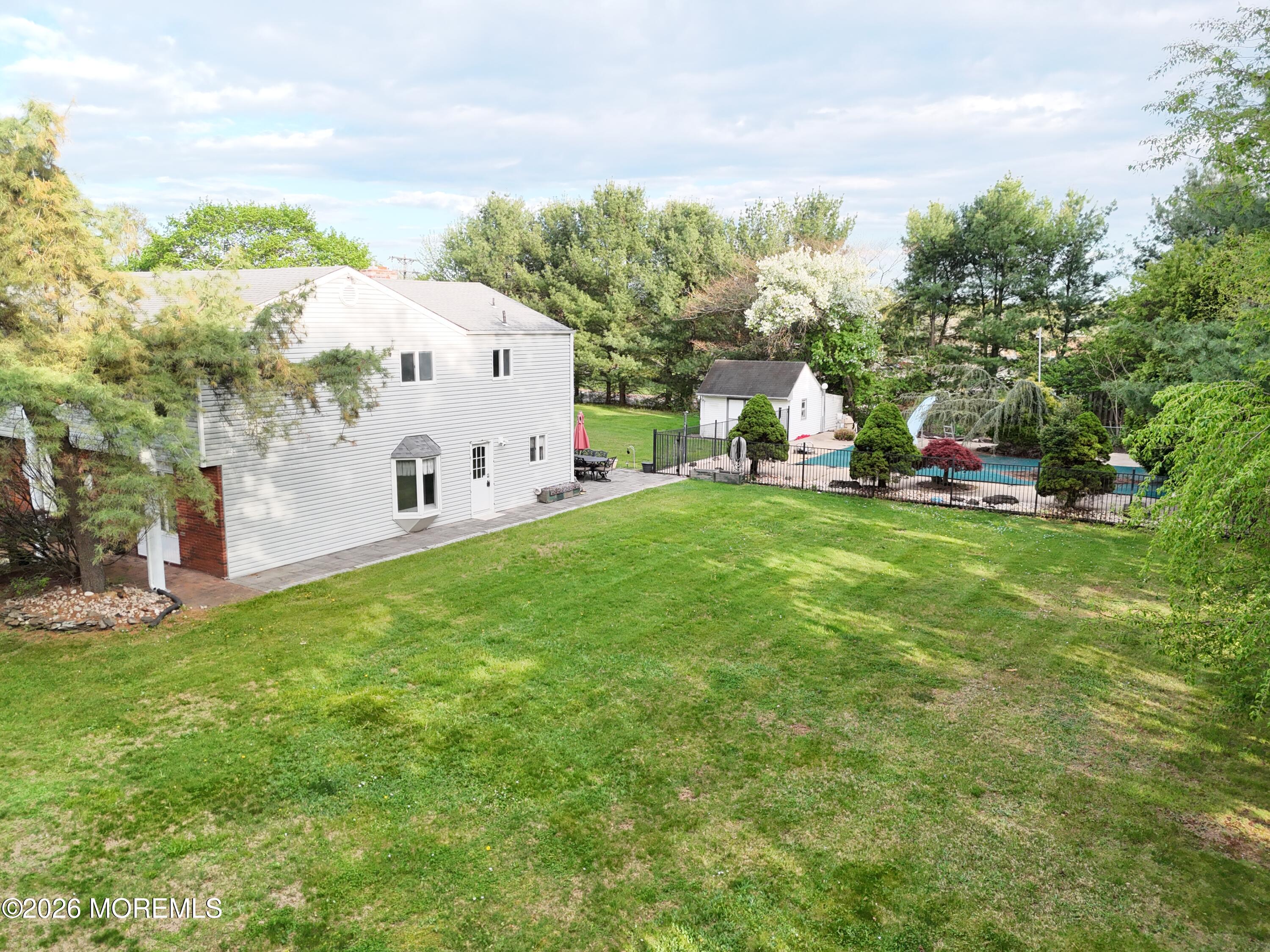 1 Flintlock Road Freehold, NJ 07728 - Photo 40 of 41 Right Side Low View with Pool