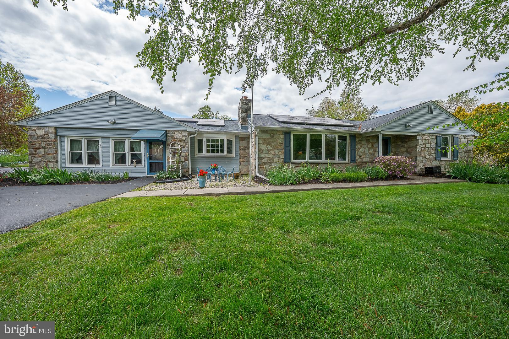 9 Buckwalter Road Audubon, PA 19403 - Photo 1 of 35 a front view of house with yard and green space
