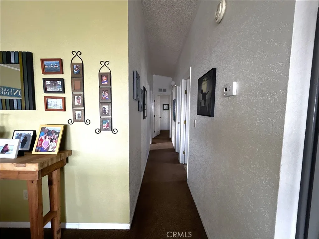2 Havasu Lake Road, Unit 2 Needles, CA 92363 - Photo 14 of 17 a view of a hallway with workspace