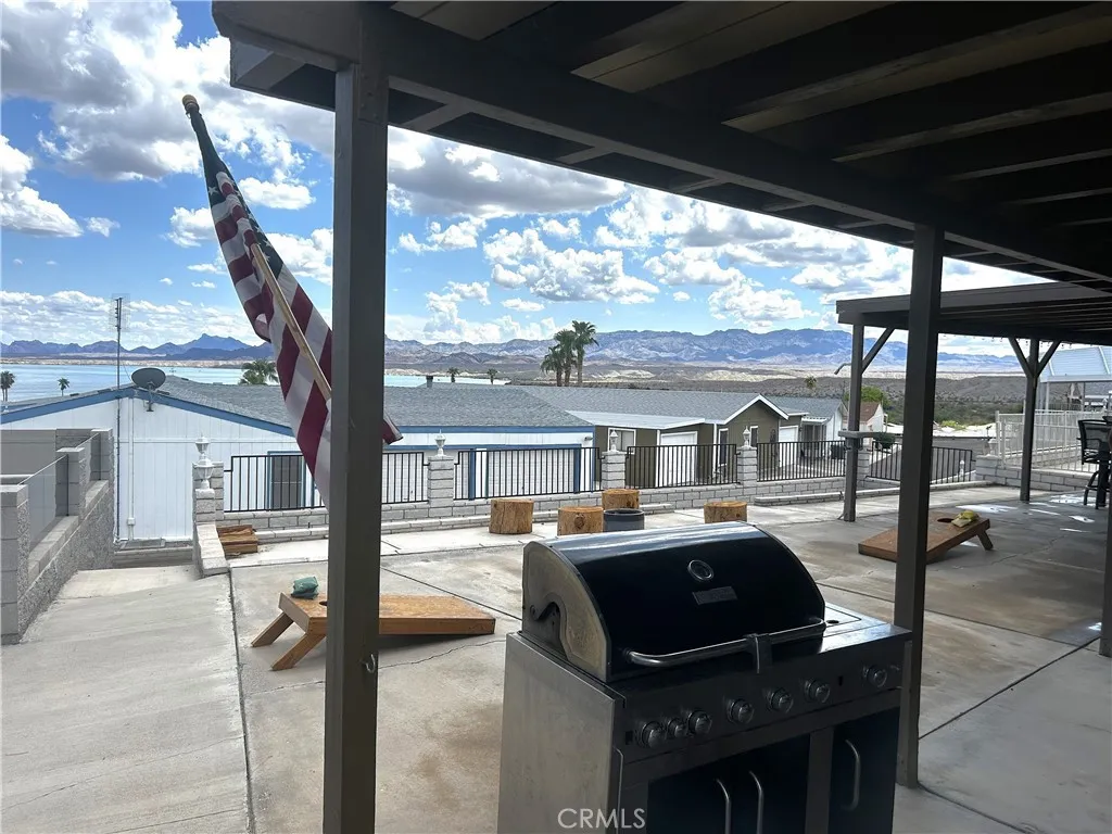 2 Havasu Lake Road, Unit 2 Needles, CA 92363 - Photo 16 of 17 a house view with a sitting space and balcony view