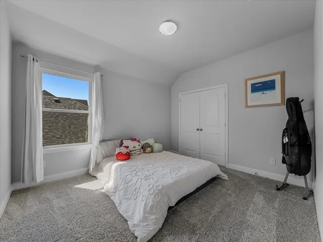 a bathroom with a sink double vanity and a mirror