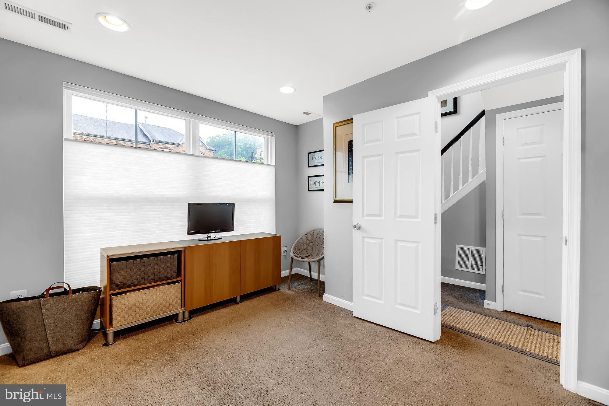 2090 Clipper Park Road Baltimore, MD 21211 - Photo 28 of 75 a view of room with furniture and a window