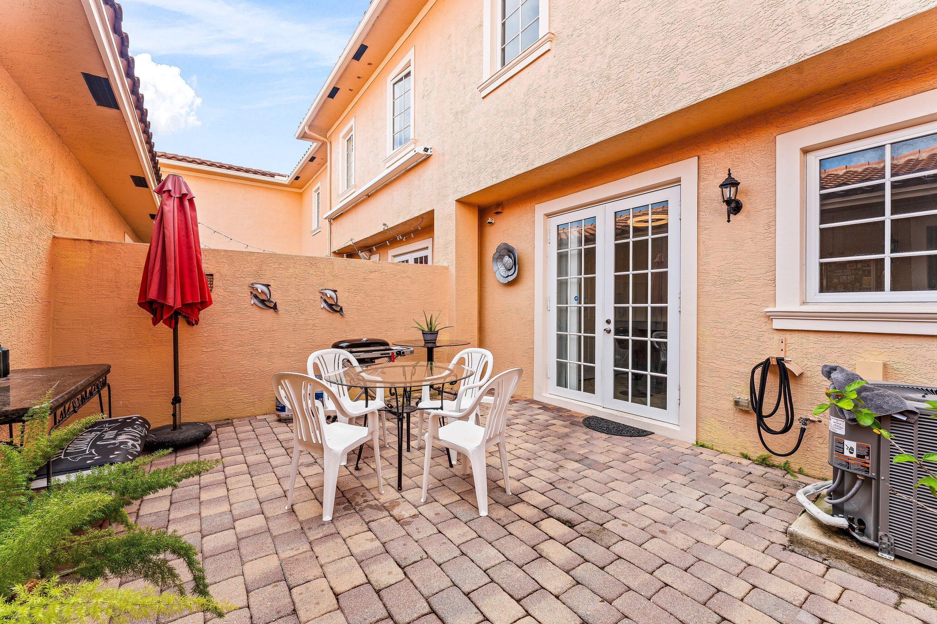 179 Edenberry Avenue Jupiter, FL 33458 - Photo 4 of 21 Spacious Patio with Grill