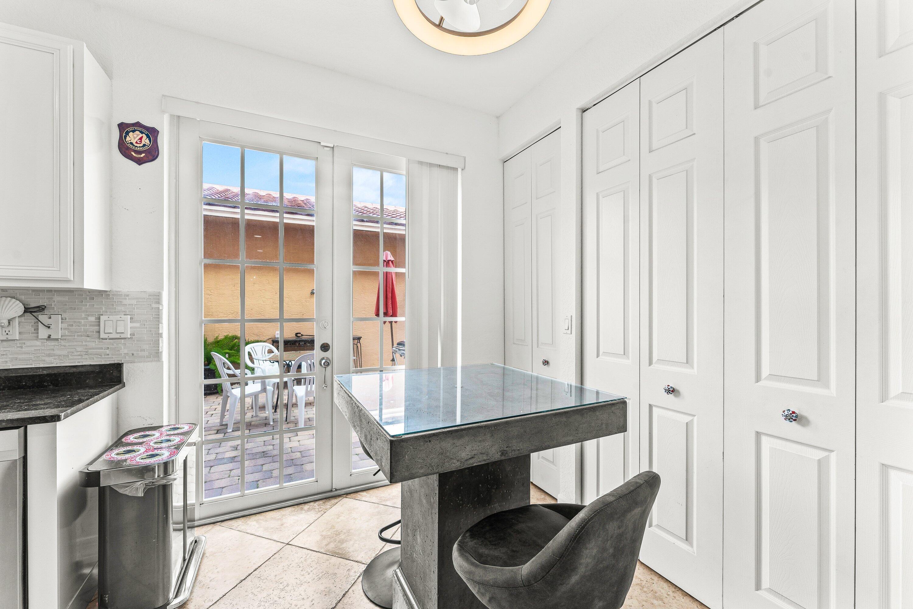 179 Edenberry Avenue Jupiter, FL 33458 - Photo 7 of 21 Backdoor to Patio