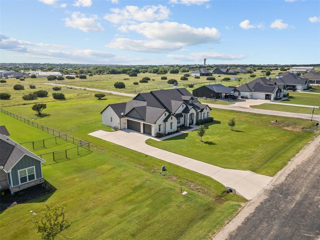 6317 Vega Road Godley, TX 76044 - Photo 2 of 27 a view of a swimming pool with a lake
