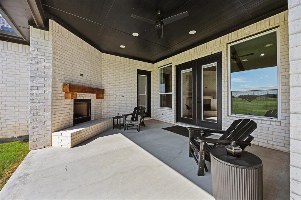 6317 Vega Road Godley, TX 76044 - Photo 26 of 28 a lobby with furniture and floor to ceiling window