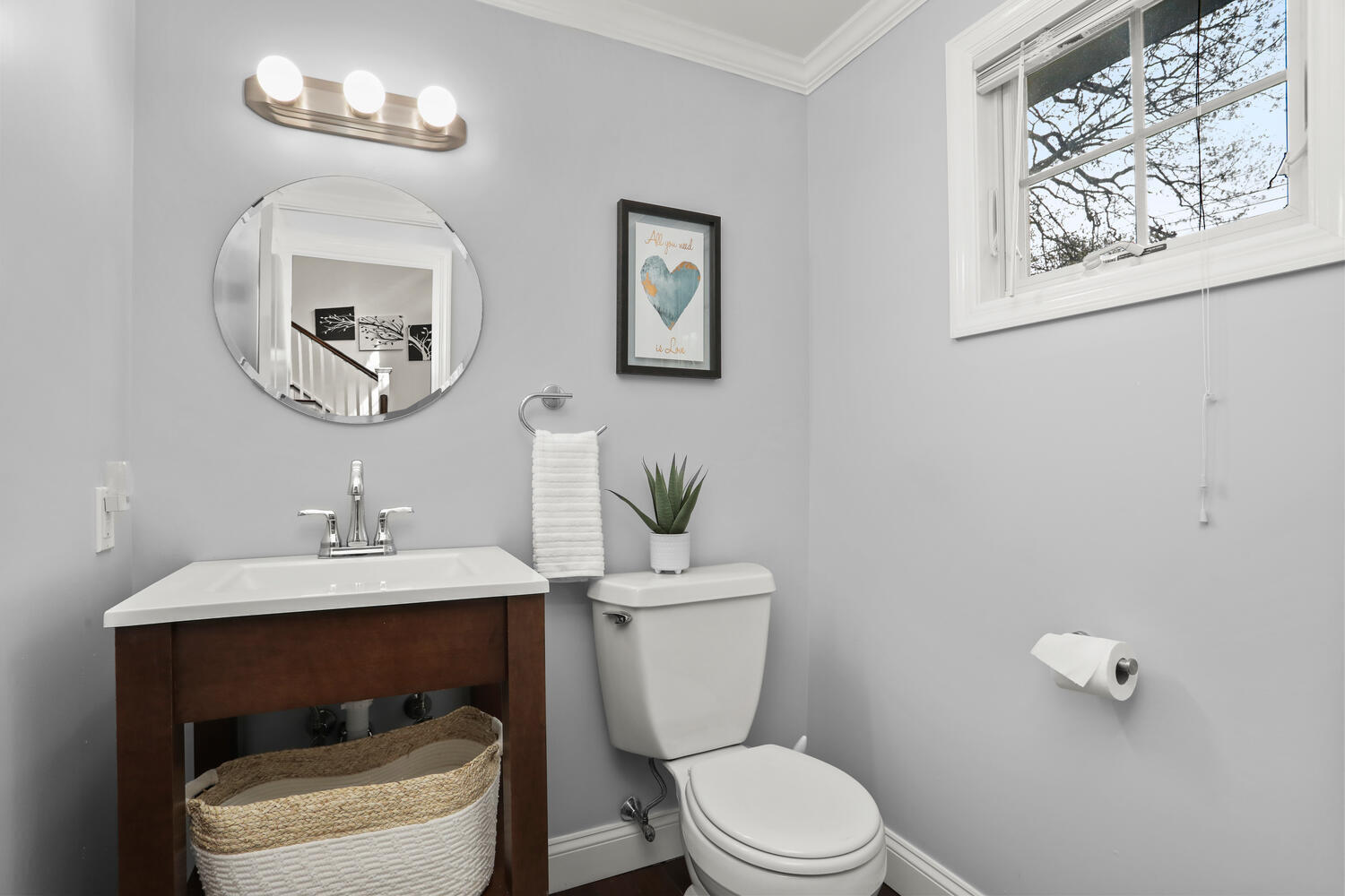 86 West Avenue Darien, CT 06820 - Photo 13 of 32 a bathroom with a toilet a sink and mirror